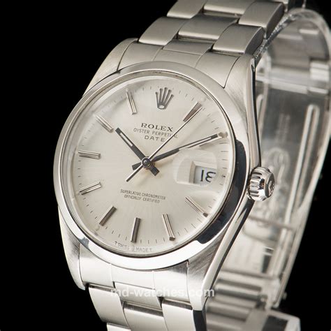 rolex oyster steel date watch.